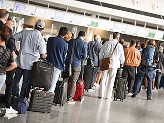 People Travelling Abroad Warne...